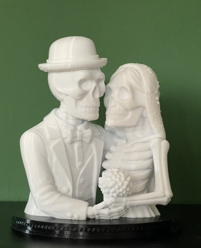 White 3D printed skeleton couple Halloween decoration on black base
