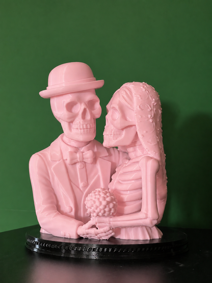 Light pink 3D printed skeleton couple figurine with black base