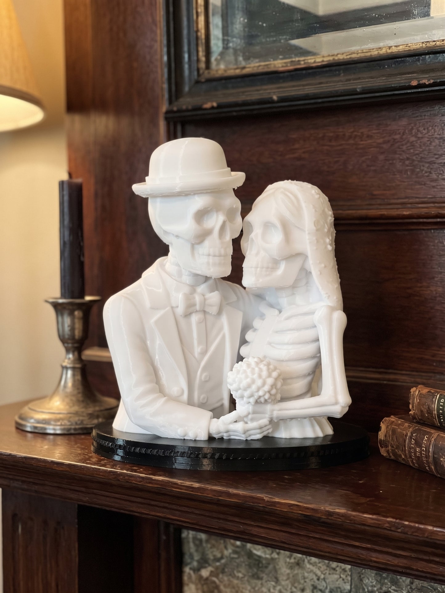 3D printed skeleton couple Halloween ornament displayed on wooden furniture