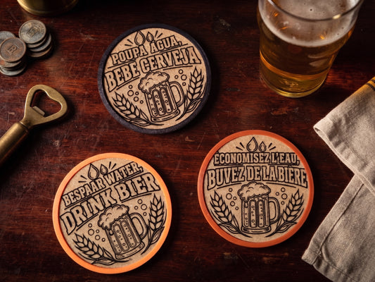 Three round beer-themed coasters arranged on a dark wooden table with a glass of beer, coins, a bottle opener, and a cloth napkin. The coasters feature vintage-style beer mug illustrations and  Portuguese, Dutch and French text: 'Poupa Agua, Bebe Cerveja,' 'Bespaar Water, Drink Bier,' and 'Economisez L'eau, Buvez De La Biere'.