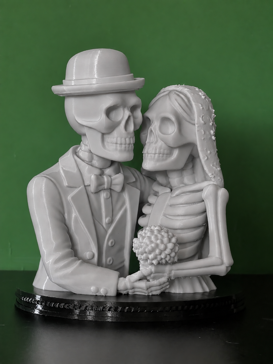 Grey skeleton couple Halloween decoration with contrasting black base